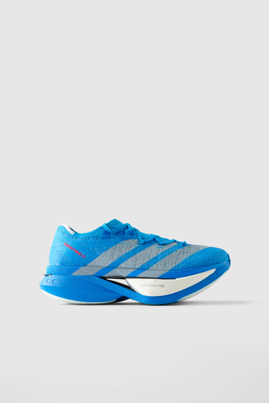 ADIZERO PRIME X3 STRUNG SOLAR BLUE, SILVER METALLIC ET LUCID RED