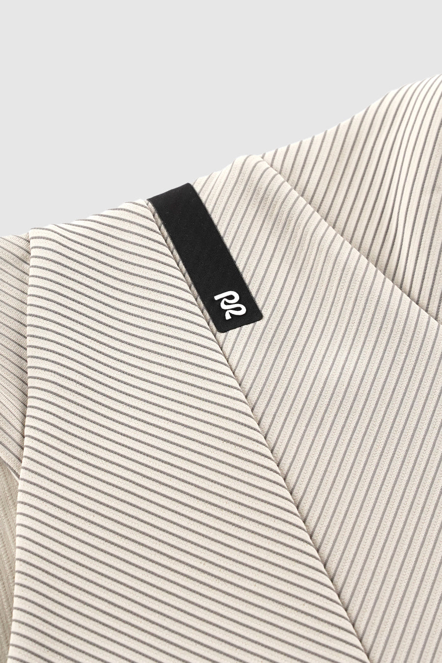 PLASTER AND SLATE STRIPED CADENCE™ ZIP FRONT RACE CROP